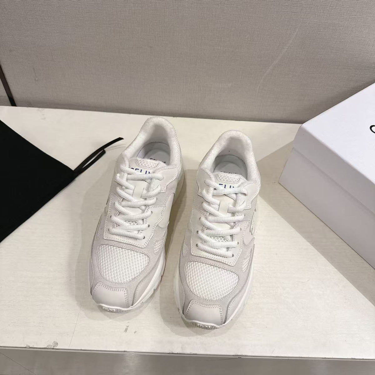 CELINE Triomphe Runner Low-Top Sneakers — Grey & White