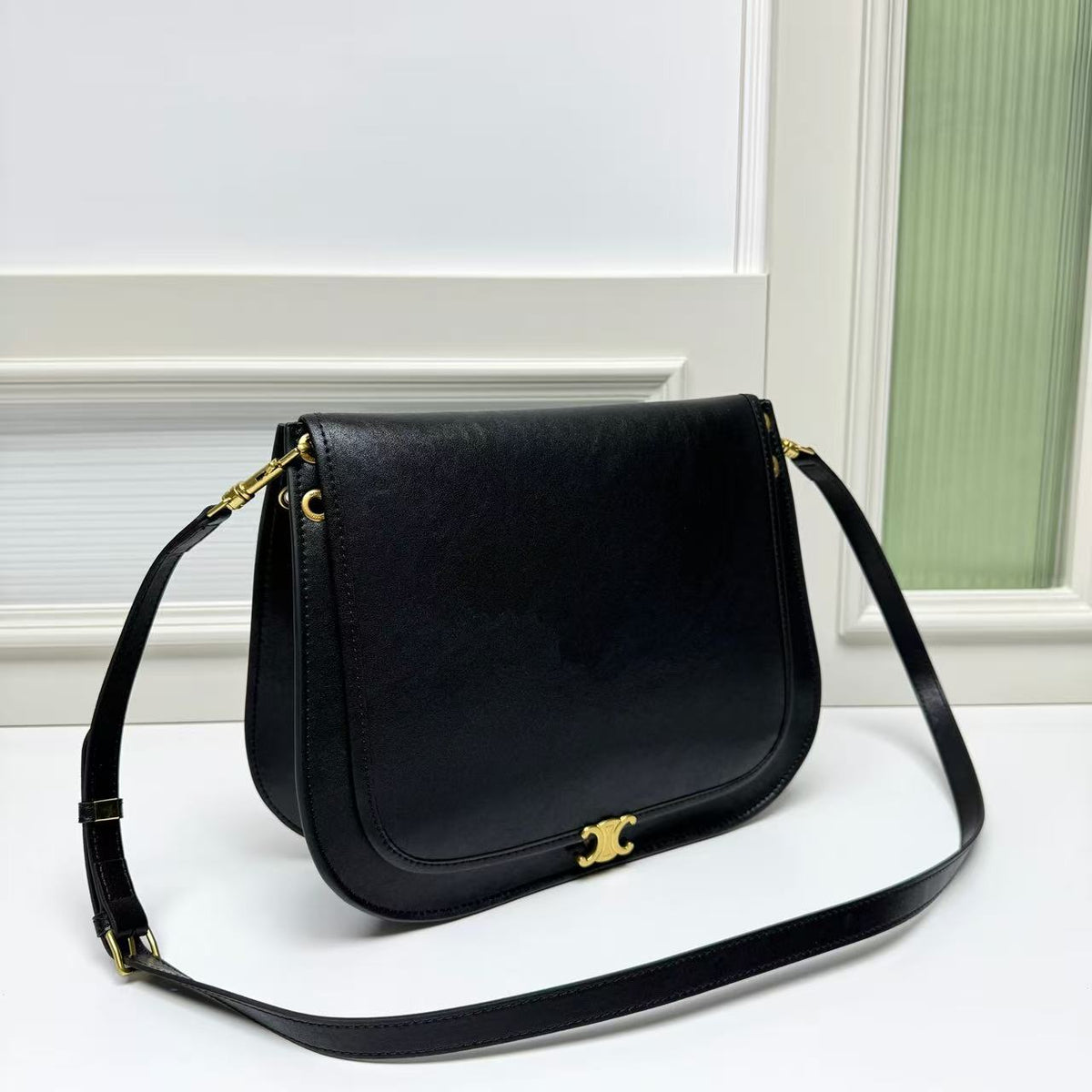CELINE Triomphe Besace Bag in Black with Gold-Tone Finish