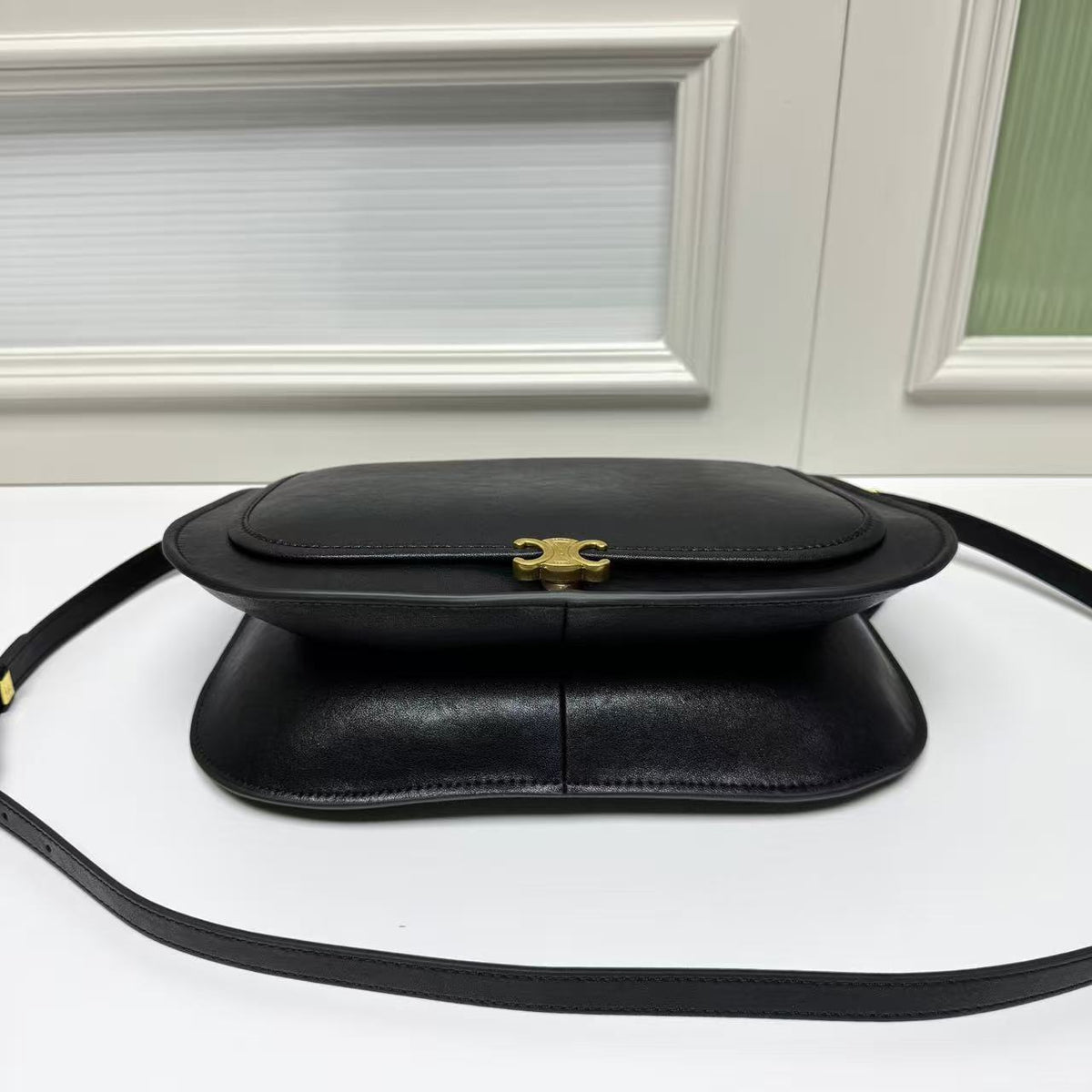 CELINE Triomphe Besace Bag in Black with Gold-Tone Finish