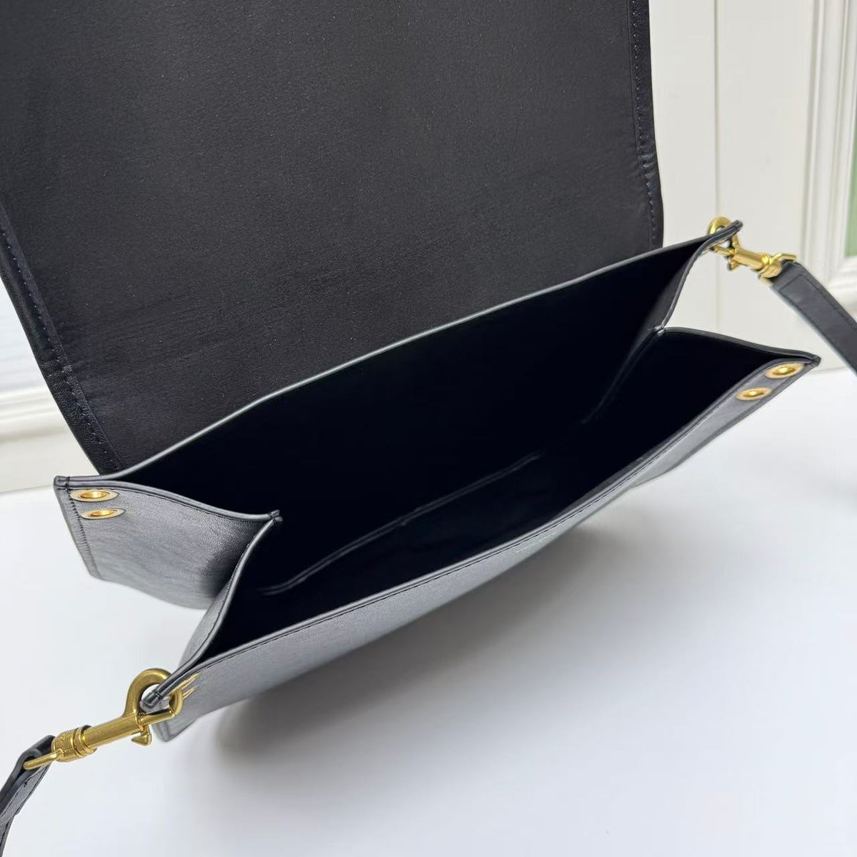 CELINE Triomphe Besace Bag in Black with Gold-Tone Finish